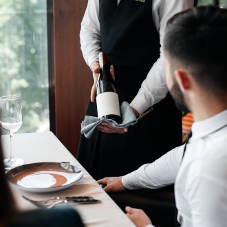 expert presents wine